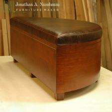 Stained-Alder-and-Leather-Curved-Front-Chest-angled