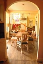 Pacific-Madrone-Leather-dining-chair-Dutch-Pull-Out-Extension-Table-Bench-Chairs-through-arch