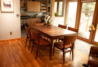 Western-Walnut-Finn-Juhl-inspired-extension-Table-Chairs-angle